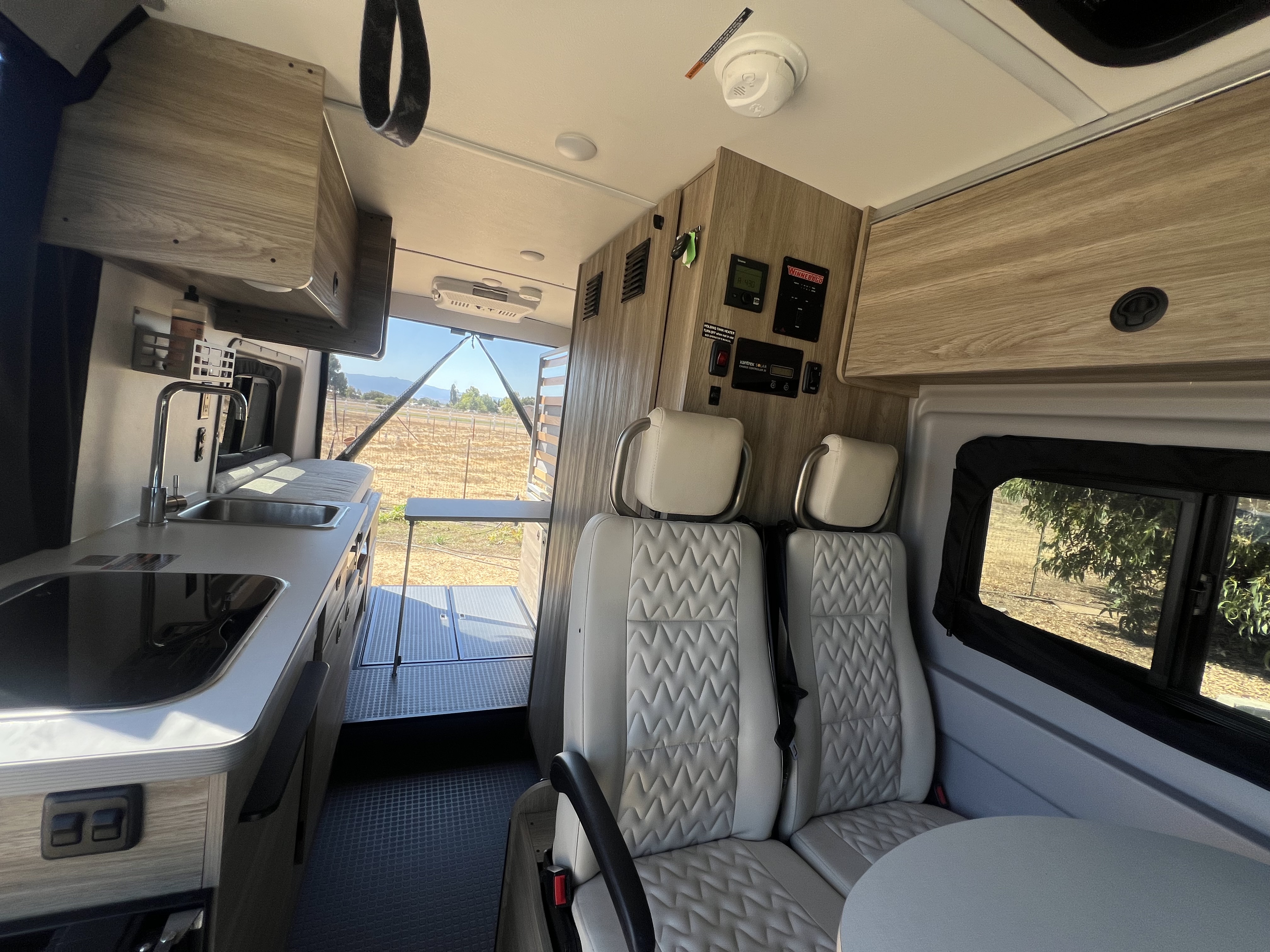 Bedding setup inside the Nomadaya van ready for sleep